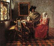 VERMEER VAN DELFT, Jan, A Lady Drinking and a Gentleman wr